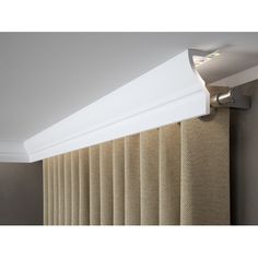 a close up view of a curtain rod with light coming from the top and bottom