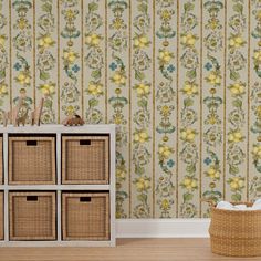 a wallpapered room with yellow flowers and baskets