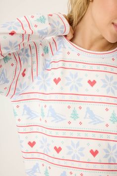 Hit the slopes in style with this winter festive long sleeve top, adorned with a playful ski-theme pattern. Made from soft, breathable fabric, this top ensures a comfortable fit for a good night's sleep or easy weekends at home. The fun ski-themed graphics add a whimsical touch, making it perfect for winter nights. Pair it with your favorite pajama bottoms for a cozy, coordinated look that celebrates the joys of the season! Ski Pajama Pants, Christmas Blanket Ski Apres, Snow Flake Pajamas, Winter Sleepwear With Character Print Long Sleeves, Playful Long Sleeve Christmas Sleepwear, Hair Socks, Cooler Lunch Bag, Brighton Jewelry, Shopping Event