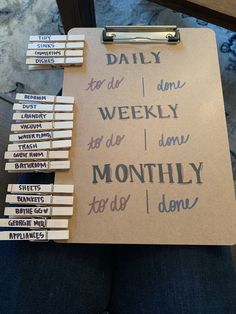 a person holding a clipboard with writing on it and several matches in front of them