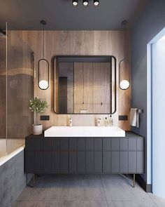 a modern bathroom with wooden walls and flooring