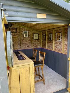 a wooden chair sitting next to a counter in a room