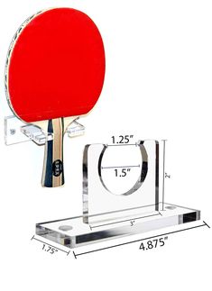 a ping pong paddle and holder for a table tennis racket