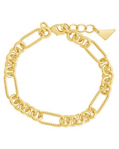 Introducing our Fianna Mixed Chain Link Bracelet, crafted with textured long links in a luxurious mixed metal design. Elevate your style with this sophisticated and exclusive piece, perfect for any occasion. Make a statement and add a touch of elegance to your wardrobe. Material: 14K gold or rhodium plated brass Features: Measures 7" length with 1" extender,,15x7mm oval links and 6mm round links lead and nickel free with lobster clasp Chain Link Bracelet Silver, Solid Gold Bracelet, Statement Drop Earrings, Mens Accessories Jewelry, Earring Sale, Jewelry Case, Cuff Bangles, Pearl Studs, Metal Design