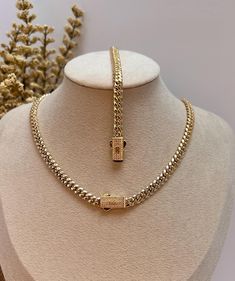 Wearing a cuban chain set is a symbol of luxury, wealth, and success. This beautiful set of Monaco chain and bracelet is designed to fit comfortably on you and to complete your everyday look. ✨DESCRIPTION✨ METAL: Stainless Steel FINISH: 14k gold plated STONE: Cubic Zirconia  WIDTH: 4mm BRACELET LENGTH: 6.5 inches and 7 inches  CHAIN LENGTH: 16 inches and 18 inches   QUALITY: WaterProof, Nickel-free, Hypoallergenic and Tarnish Free COLOR: Gold CLOSURE: BOX ✨JEWELRY CARE QUIDE✨ * Bath with warm so 20th Bday, Crystal Jewelry Necklaces, Elegant Baby, Classy Jewelry, Stacked Jewelry, Solid Gold Jewelry, Cuban Link Chain, Cuban Chain, Elegant Necklaces