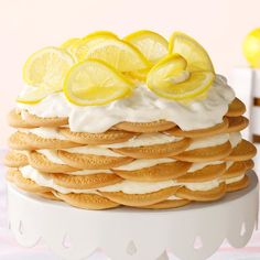 a stack of cookies with lemon slices on top