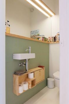 the bathroom is clean and ready to be used as a storage area for toiletries