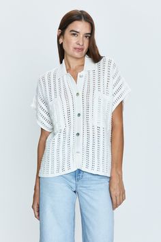 Not your grandma's knit. Vacation ready short sleeve crochet shirt with semi-sheer open weave construction. Button up front closure, with open front pockets and a soft collar neckline.¬† ¬† 77% Viscose / 23% Nylon Imported Crochet Polo, Sleeve Crochet, Best Swimwear, Crochet Shirt, Open Weave, Denim Jumpsuit, Romper Pants, Front Open, Sweater Top