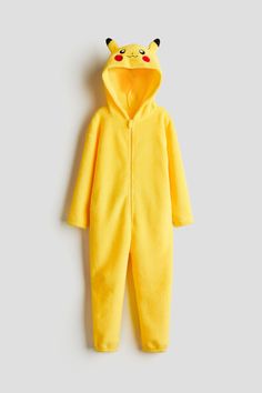 Full-length costume jumpsuit in soft pile. Hood with embroidered details and ear-shaped appliqués. Zipper at front with anti-chafe chin guard. Made to be used and loved for a long time – take care of it  pass it on  repair  and recycle. Casual Winter Onesie For Costume Events, Casual Winter Onesie Costume, Yellow Pokemon, H&m Yellow Beach Dress, Anti Chafing, M Beauty, Fashion Company, Kids Boys, H&m