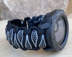 "FREE USPS PRIORITY MAIL SHIPPING FOR DOMESTIC US ORDERS (Includes U.S. Military APO/FPO Address Overseas) Thank you for visiting our shop \"Cording 2U\". A veteran owned business. Handcrafted Paracord wearables customized \"According To You\". Handcrafted with 100% Nylon Paracord \"MADE IN USA\" Our Products include: 🔹Custom handcrafted watch bands according to your wrist size, style, and color of choice. If you don't see it in our page yet, please contact us and we can discuss your options. ? Paracord Watch, Garmin Instinct, Weaving Book, Tactical Watch, Cool Rings For Men, Handmade Watch Bands, Nordic Tattoo, Spring Valley, Garmin Forerunner