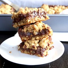 Oatmeal Fudge Barsoatmeal cookie bars topped with a layer of rich chocolate fudge and then more oatmeal cookie. Chocolate Revel Bars Oatmeal, Revel Bars Recipe Oatmeal, Revel Bars Recipe, Revel Bars, Chocolate Cookie Bars