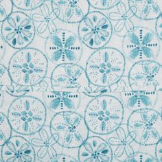 blue and white fabric with circular designs on it