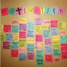 a bulletin board that has been decorated with notes on it and the words motivation written in different languages