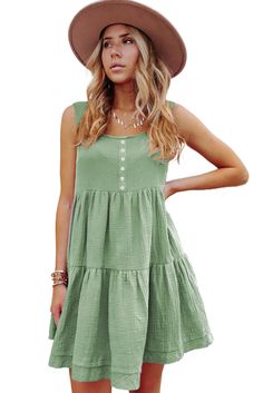 Green Tiered Ruffled Mini Dress Casual Cotton Tiered Dress With Ruffles, Green Casual Sundress With Ruffles, Green Knee-length Ruffle Dress For Summer, Green Casual Ruffle Dress For Spring, Casual Green Ruffle Dress For Spring, Green Tiered Summer Dress With Ruffles, Summer Green Tiered Dress With Ruffles, Casual Tiered Ruffle Dress With Ruffle Hem, Casual Green Sundress With Ruffle Hem