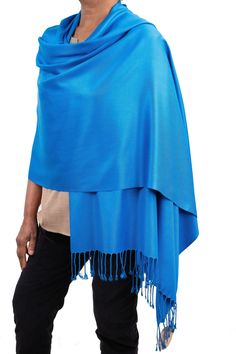 If you are looking for a Blue Shawl or a Royal Blue Wedding Pashmina, you're in the right place. Our range of Pashmina Scarves come in over 30 great colours including this our beautiful Blue  Bridal Shawl.  Our Pashminas are very well made from a quality yarn and with the dense weave they have a wonderful drape. Many of the other Pashminas for sale elsewhere are actually a bit on the short side at 180cm but ours are the traditional 200cm length. This allows them to be worn as a shawl by women of Festive Blue Silk Shawl, Traditional Blue Jamawar Pashmina Shawl, Elegant Blue Pashmina Shawl, Festive Blue Silk Pashmina Shawl, Blue One-size Winter Shawl, Tartan Shawl, Pink Shawl, Evening Shawls, Blue Shawl