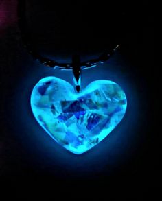 Small heart that glows in the Dark with blue iridescent flakes. Chain included is 18" Stainless steal in your choice of Silver or 18k Gold Plated. Luminous Jewelry For Valentine's Day Gift, Valentine's Day Luminous Jewelry Gift, Blue Luminous Jewelry For Party, Magical Luminous Blue Jewelry, Luminous Blue Jewelry For Parties, Blue Luminous Jewelry For Gifts, Glow In The Dark Necklace, Pink Purple Blue, Stainless Steal