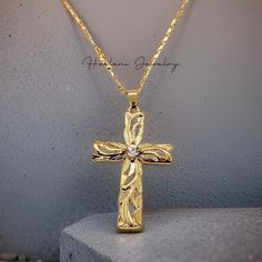 High Quality Gold Plated Hawaiian Heirloom Cross CZ Pendant with Necklace. The gold plated necklace measures 21 inches with a 3 inch extender attached for your adjustment. You can easily adjust the necklace to your fitting up to 24 inches in length. The Gold chains are solid and sturdy and very durable. Gold Necklace For Wedding, 16 Inch Length, Gold Pendant Cross Necklace With Clavicle Chain, Gold Cross Pendant Necklace With Adjustable Chain, Gold Pendant Cross Necklace With Adjustable Chain, Gold Pendant Chain Necklace 16 Inch, Gold Chain Necklace 16 Inch As Gift, Gold Cross Pendant Jewelry Gift, Gold Plated Engraved Cross Pendant Necklaces, Gold Plated Engraved Cross Pendant Necklace