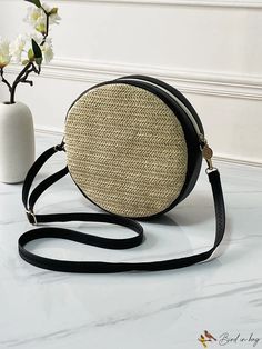 BirdinBag - Compact Metal Embellished Straw Bag Black Beach Bag With Detachable Strap, Black Bag With Detachable Strap For Vacation, Black Shoulder Bag With Detachable Strap For Vacation, Circle Bag, Metal Straws, Functional Accessories, Bag Bag, Metallic Accents, Color Khaki