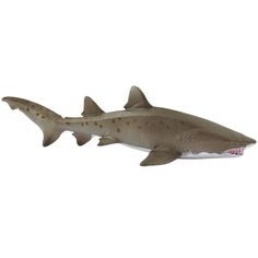 a toy shark is shown on a white background