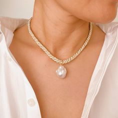 Discover elegance and modernity with our Satin Rope Baroque Pearl Necklace. This necklace showcases a satin rope with an elegant design, accompanied by a stunning pearl for an added touch of sophistication. Perfect for any event, modern and refined. 16" rope with a 2" extender Genuine baroque pearl, satin rope Each baroque pearl shape and color may vary due to the characteristics of natural materials. Alpharetta Georgia, Black Pearl Necklace, Baroque Pearl Necklace, Hair Setting, Pearl Collection, Moissanite Jewelry, Hair Fragrance, Scrunchie Hairstyles, Steel Jewelry