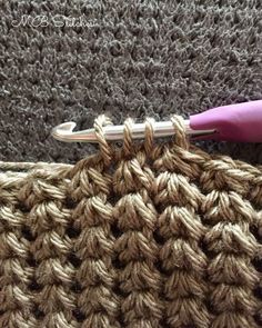 the crochet stitch is being worked on