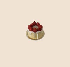 a small cake with white icing and strawberries on top