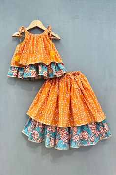 Shop for this happy collection of Orange Cotton Printed Bandhani Double Layered Lehenga And Top Set by Label Neeti online at Aza Fashions. Double Layered Lehenga, Chiffon Blouses Designs, Cotton Frocks For Kids, Frocks For Kids, Printed Lehenga