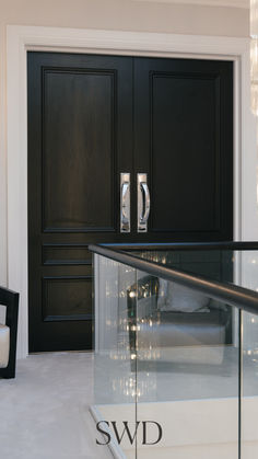 Enhance your space with these luxurious black double doors, featuring elegant panel detailing and polished chrome handles for a sleek, modern finish. Perfect for interior entrances, offices, or living spaces, these doors offer timeless beauty and durability. The bespoke design combines classic craftsmanship with contemporary style, creating a bold and sophisticated statement for any interior. Elevate your home with this custom-made feature that blends elegance and function

#swdbespoke
#bespokedoors
#luxurydoors
#highglossdoors
#oakdoors
#bespokeoakdoors
#luxuryoakdoors
#oakstaineddoors
#internaldoors
#interiordoors
#bespokedoorsuk
#bespokedoorsdubai
#uniquedoors
#luxurydoorsusa
#luxurydoorsdubai