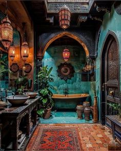 an ornate bathroom with blue walls and tile flooring is pictured in this image, there are hanging lights above the bathtub