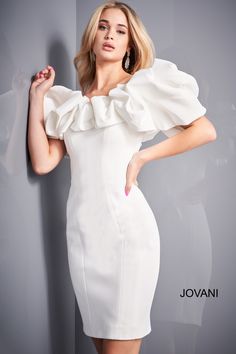 All eyes will be on you in this ruffled neckline short off the shoulder dress with a fitted skirt by Jovani 04367. Ruffled Short Off Shoulder Dress by Jovani 04367 Designer: Jovani Length: Short Silhouette: Sheath Details: Ruffles Fabric: Crepe, Mikado, Scuba Neckline: Off-the-Shoulder Fit: The model is 5'8" and is wearing 4" heels Colors: White, Black, Tomato, Light Blue Sizes: 00 to 24 Occasions: Semi-Formal, Homecoming, Cocktail Party, Damas Court, Prom, Graduation, Wedding Guest, Special Occ Ruffle Cocktail Dress, Cocktail Dress White, Ruffle Neck Dress, Fashion Bella, Embroidered Lace Dress, Ruffle Fabric, Jovani Dresses, White Off Shoulder, Cocktail Dress Lace