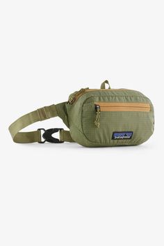 Great for any adventure, this Patagonia Ultralight Mini Hip Pack in Buckhorn Green has got us wanting to go on more adventures. There is a main zipper compartment to carry all your essentials needs and turns inside out for easy storage. Going on a hike has never been easier!Features:PatagoniaStyle: 49447-BUGRColor: Buckhorn Green100% Recycled NylonPatagonia hip packTurns inside for easy storageAdjustable clipTop zipperSide zipperPadded back for hip comfortPatagonia logo patch on front Patagonia Style, More Adventures, Animal Shoes, Hip Pack, Youth Shoes, Swim Shoes, Sneaker Slippers, Shoe Boot Sandals, Judy Blue Jeans