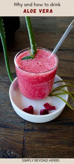 a smoothie in a glass with strawberries on the side and text overlay that reads, why and how to drink aloe vera