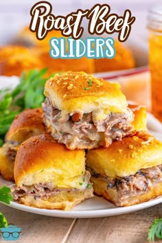 three sliders stacked on top of each other with text overlay that reads roast beef sliders