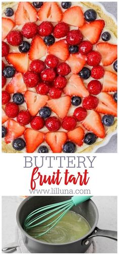 a pan filled with strawberries and blueberries next to a metal whisk