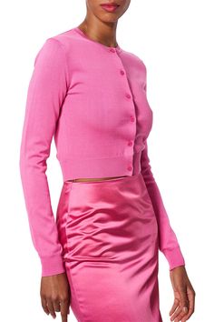 Carolina Herrera long sleeve cardigan in rose. 55%SE 45%CO Dry Clean Made in China Feminine Fitted Long Sleeve Cardigan, Fitted Long Sleeve Feminine Cardigan, Pink Fitted Elegant Sweater, Fitted Feminine Cardigan, Feminine Pink Long Sleeve Cardigan, Pink Long Sleeve Sweater For Work, Elegant Pink Winter Cardigan, Elegant Pink Spring Cardigan, Elegant Fitted Pink Cardigan