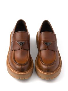 Find PRADA Leather Loafers on Editorialist. camel brown leather enamel triangle logo slip-on style round toe ridged rubber sole Brown Womens Shoes, Prada Loafers, Prada Leather, Triangle Logo, Prada Shoes, Brown Shoe, Leather Loafers, Loafer Flats, Rubber Sole