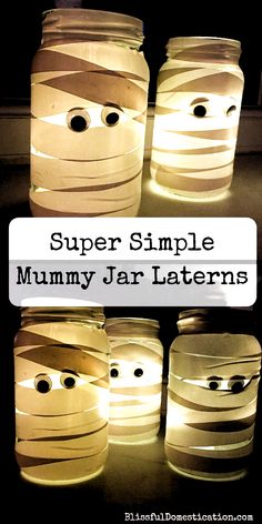 four mason jars with faces and eyes made out of paper, the words super simple mummy jar lanterns