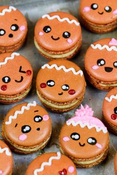 gingerbread macarons are arranged on a baking sheet with the words gingerbread macaroons