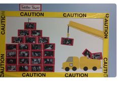 a construction themed bulletin board with pictures on it