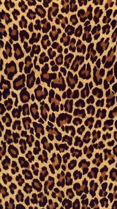 an animal print fabric with brown and black spots