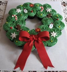 a cupcake decorated like a christmas wreath