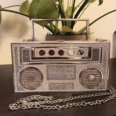 Gorgeous! Crystal Radio Clutch, Radio Boombox Rhinestone Purse, Novelty Purse, Bridal Rhinestone Crossbody Purse, Crystal Handbag, Evening Purse. This Beautiful Retro Rhinestone Studded Radio Boombox Evening Bag Is The Perfect Date Night Accessory And Is A Definite Showstopper, Attention Grabbing Piece! Luxurious Metal Radio/ Old School Boombox Shaped Sparkly Clutch With Thousands Of Sparkling Rhinestones. A Fun Evening Bag For A Night Out On The Town, Wedding, Birthday, Or Any Event Where You W Silver Rectangular Evening Bag With Bling, Silver Rectangular Bags With Bling, Silver Rectangular Evening Bag With Rhinestones, Crystal Radio, Sparkly Clutch, Rhinestone Purse, Crystal Handbag, Novelty Purses, Cross Shoulder Bags