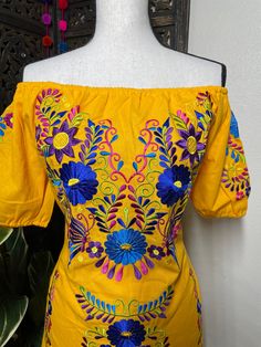 "Beautiful Floral Embroidered Dress - Handmade Embroidered Mexican Dress - Artisan Made Dress Beautiful hand embroidered dress! This has been made and brought directly from Puebla, Mexico. The dress has extremely detailed embroidery. The embroidery is 100% handcrafted. All the work on this dress has a professional skilled finish and the multicolor embroidered makes it look even more eye catching. The embroidery work is made with great quality thread. The eye catching will be on the embroidered w Traditional Multicolor Embroidered Dress For Spring, Traditional Fitted Dress With Geometric Embroidery, Fitted Traditional Dress With Geometric Embroidery, Multicolor Floral Embroidered Festival Dress, Multicolor Floral Embroidery Festival Dress, Multicolor Floral Embroidery Dress For Festival, Traditional Cotton Dresses With Tonal Embroidery, Traditional Embroidered Dress With Geometric Patterns For Festivals, Spring Embroidered Dress With Multicolor Machine Embroidery