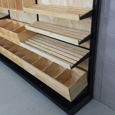 the wooden shelves are stacked high on each other in order to be used as storage