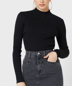 Classic black knit top. Imported AC2766B Black Long Sleeve Fine Knit Top, Black Fine Knit Long Sleeve Tops, Trendy Black Stretch Sweater, Elegant Black Turtleneck Knit Top, Black Stretch Crew Neck Knit Top, Fitted Black Turtleneck Sweater, Black Fine Knit Turtleneck Sweater, Black Fitted Turtleneck Sweater, Black Ribbed Fitted Tops