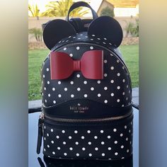 Nwt Kate Spade Disney Minnie Mouse Red Bow Polka Dot Black Multi Adorable Disney Backpack Measurement: 8” (W) X 10.5” (H) X 4" (D) Adjustable Strap Zip Closures Exterior: 1 Large Zip Pocket In Front Interior: 1 Large Pocket And 1 Zip Pocket Will Ship Fast!! We Only Sell Brand New And 100% Authentic Merchandise. Shop With Confidence Thank You For Looking & Happy Shopping Black Minnie Mouse Bag For Back To School, Trendy Minnie Mouse Travel Backpack, Black Minnie Mouse Backpack For Back To School, Trendy Minnie Mouse Backpack For Travel, Casual Minnie Mouse Backpack For Travel, Casual Minnie Mouse Bag For Back To School, Casual Minnie Mouse Back To School Bag, Back To School Minnie Mouse Black Backpack, Black Mickey Mouse Backpack For Daily Use