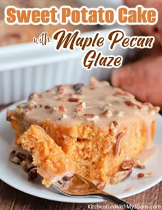 sweet potato cake with maple pecan glaze is on a white plate and has a fork in it