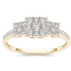 three stone diamond engagement ring in yellow gold