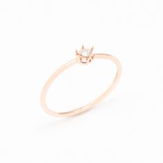 Dainty Diamond Rose Gold Ring set with Natural Diamond, size 2 millimeters diameter, 0.6 Carats.Solid 14k Rose Gold ☞ made to last.Click here for ☞ Solid Gold CollectionDiamond Details:• CERTIFIED Natural Diamond• Weight: 0.6 Carats• Dimensions: 2mm• Color: G• Clarity: I1• Cut: Very GoodSolid Gold Details:• 1 gram of 14k Solid Rose Gold• Dimensions: Band width ≈ 1mm, thickness ≈ 1mm• Lasts a lifetime - Perfect for everyday use (won’t tarnish)!*Final weight & dimensions depending on the chosen ri 14k Rose Gold Midi Promise Ring, Delicate Solitaire Rose Gold Stackable Rings, Rose Gold 14k Midi Promise Ring, Rose Gold Midi Rings Fine Jewelry, Dainty 14k Rose Gold Diamond Ring, Rose Gold Rings With Single Diamond In Round Band, Rose Gold Ring With Single Diamond In Round Band, Fine Jewelry 14k Rose Gold Midi Rings, Rose Gold Solitaire Midi Rings As Gift