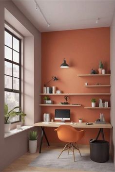 an office with orange walls and shelving in the corner, along with a computer desk